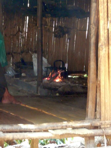 fire inside bamboo hut